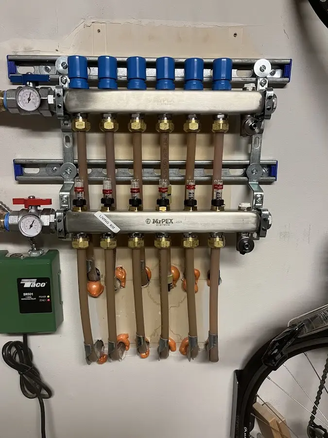 Plumber performing Gas Line Installation at a residential property in Chartiers