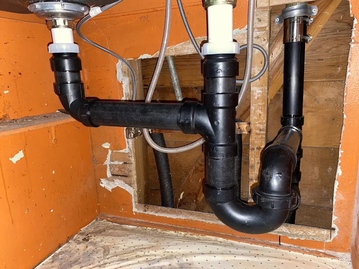 Professional Garbage Disposal Repair equipment and tools on the job in Chartiers